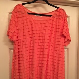 Coral colored blouse